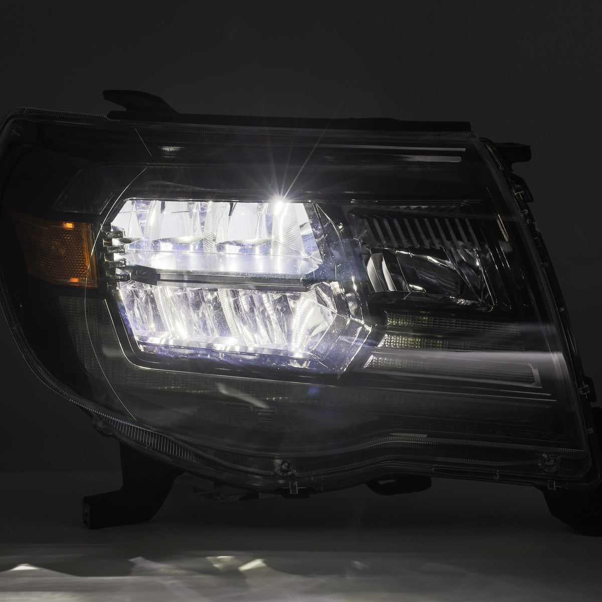AlphaRex 880735 05-11 Toyota Tacoma LUXX Crystal Headlights Plank Style Design Black with Activation Light/DRL