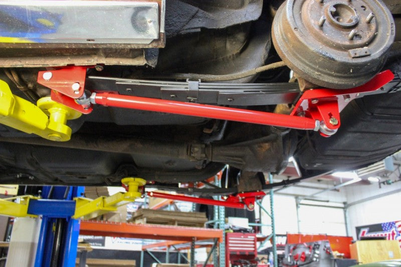 UMI Performance 262824-R Leaf Spring Traction Bars with Mounts Red