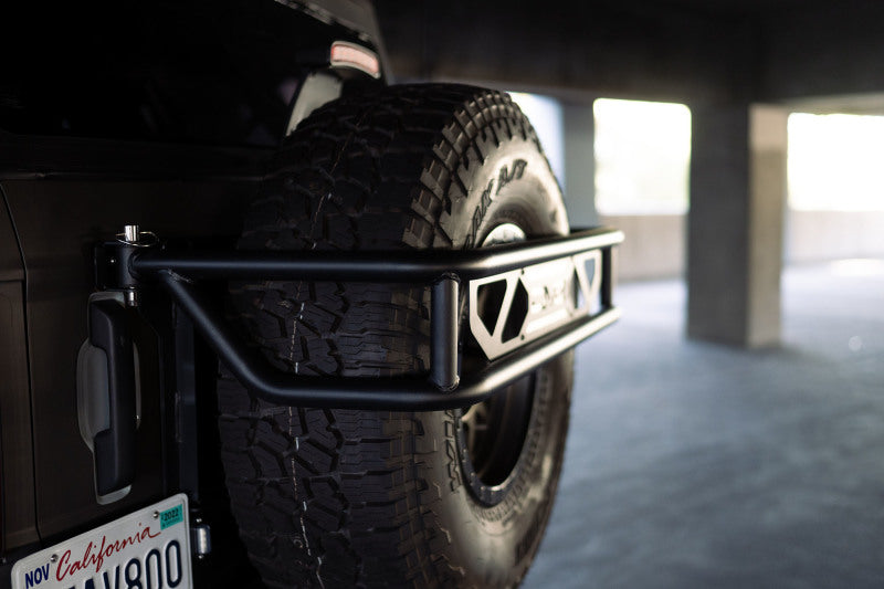 DV8 Offroad 21-23 Ford Bronco Spare Tire Guard & Accessory Mount - #TCBR-01