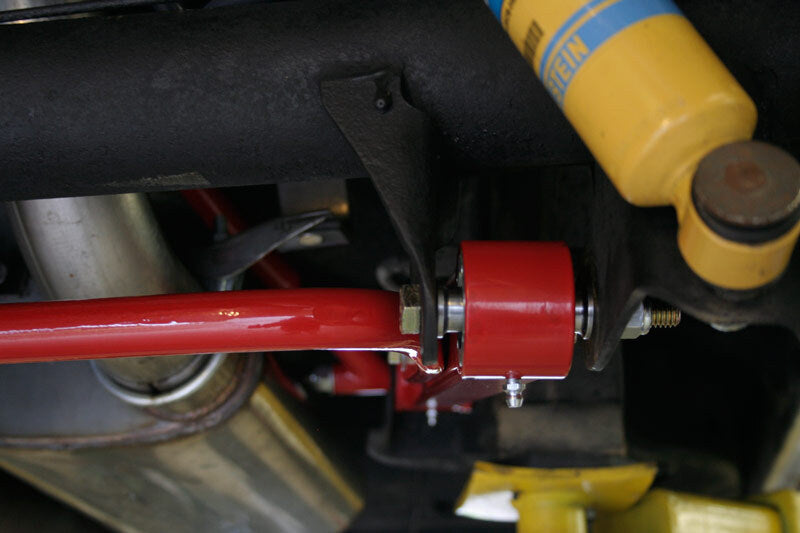 UMI Performance 4042-R Boxed Lower Control Arms with Dual Roto-Joints Red