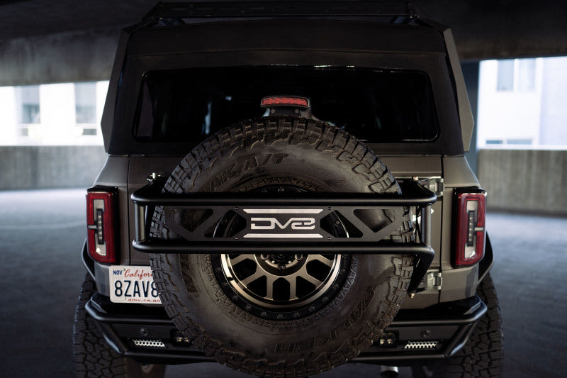 DV8 Offroad 21-23 Ford Bronco Spare Tire Guard & Accessory Mount - #TCBR-01