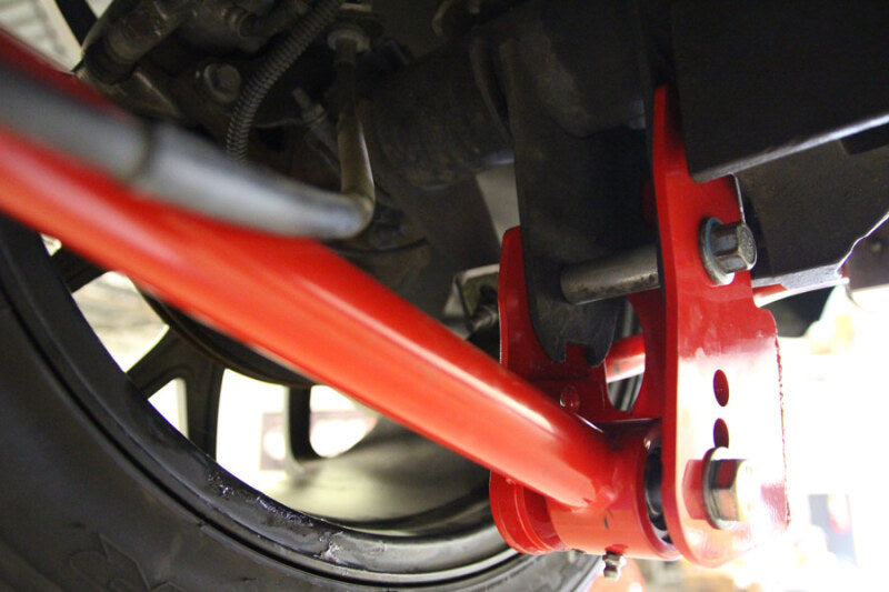 UMI Performance 1060-R Rear Control Arm Relocation Brackets Bolt-In Red