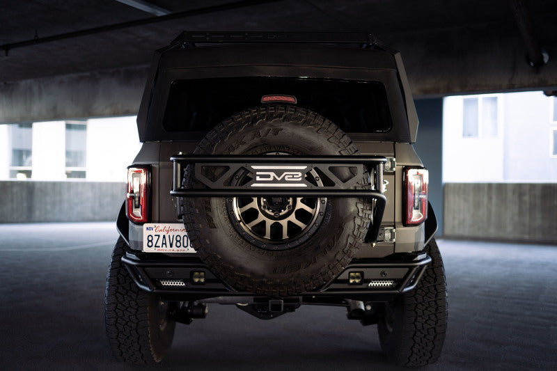 DV8 Offroad 21-23 Ford Bronco Spare Tire Guard & Accessory Mount - #TCBR-01