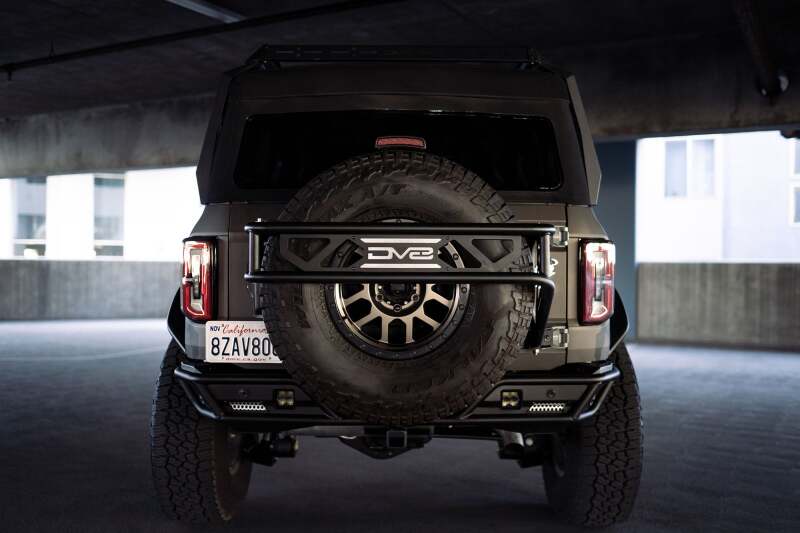 DV8 Offroad 21-23 Ford Bronco Spare Tire Guard & Accessory Mount - #TCBR-01