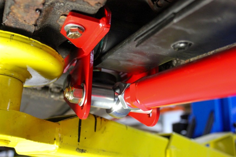 UMI Performance 262824-R Leaf Spring Traction Bars with Mounts Red