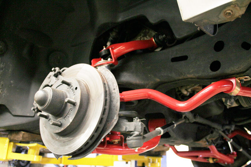 UMI Performance 3035-R 1.25in Solid Chrome Moly Front Sway Bar Red