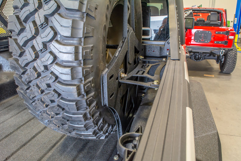 DV8 Offroad 2019+ Jeep Gladiator Universal Stand Up In-Bed Tire Carrier - #TCGL-02