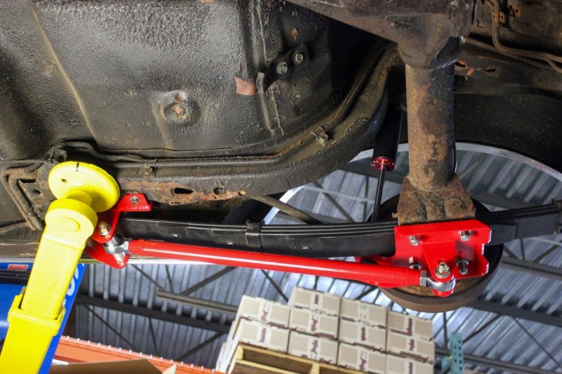 UMI Performance 262824-R Leaf Spring Traction Bars with Mounts Red